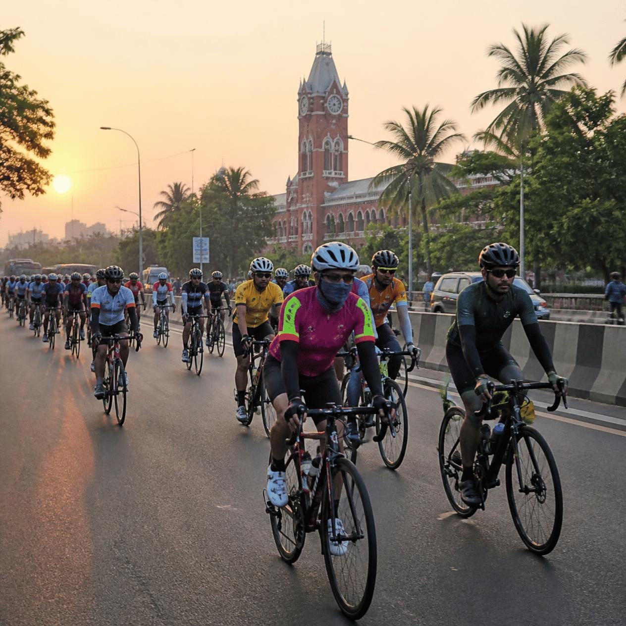 Group of cyclists gathered together in the city